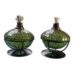 Tabletop torches covered in green crystals